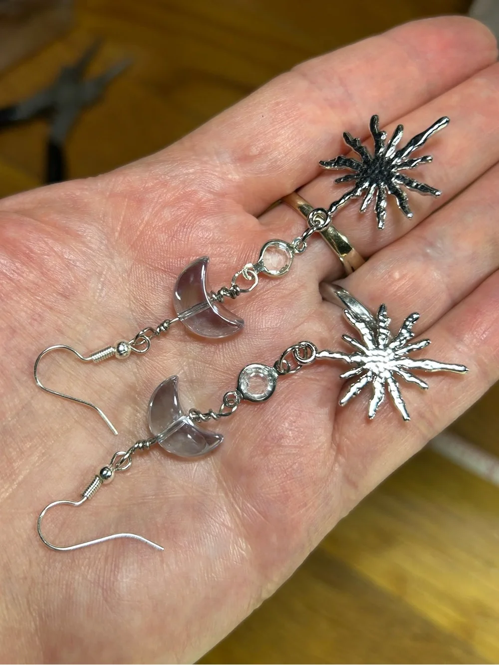 3/$25 Silver Moon & Starburst Dangle Earrings with Blue Accent